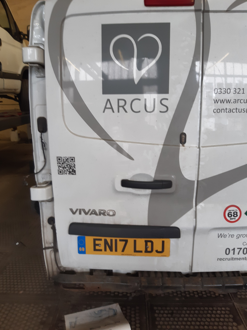 A white van with Silver Vinyl sign writing