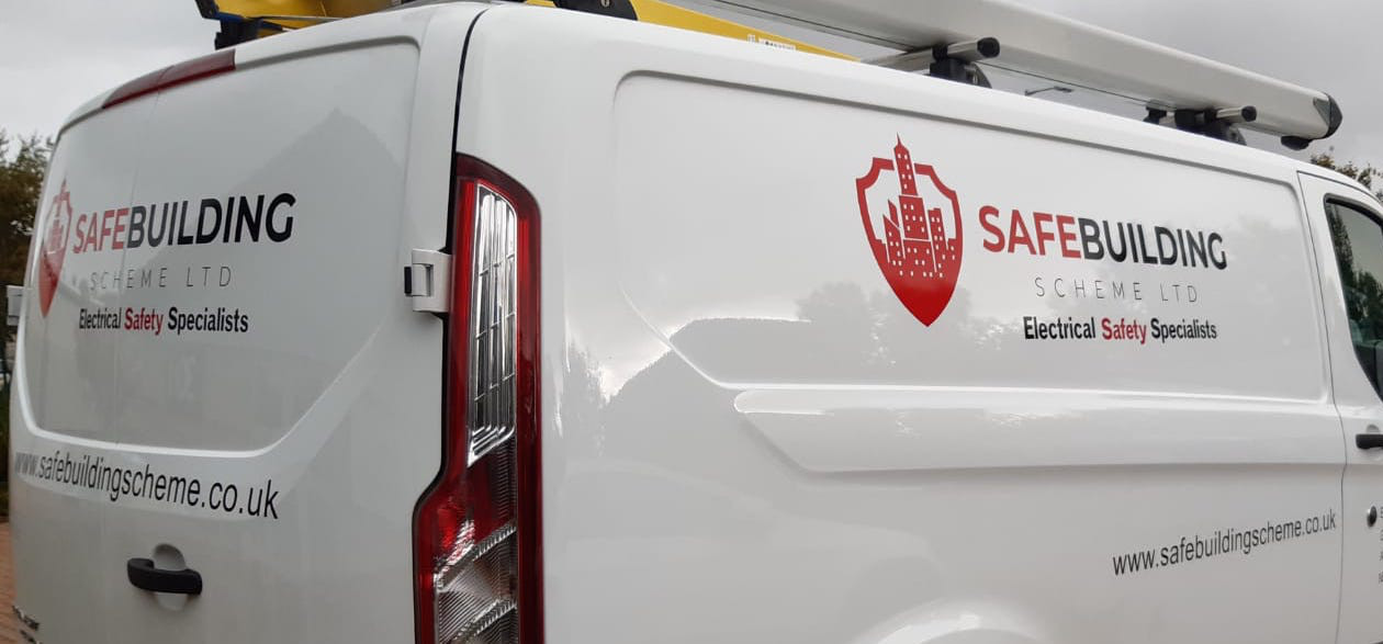 A white van with red and black writing